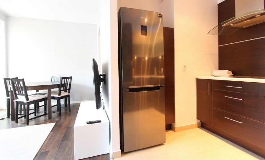 Salon z aneksem kuchennym, duży balkon + piwnica+miejsce parkingowe w hali miniaturka 7
