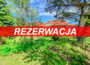 Parterowy dom z pięknym ogrodem. Las i jezioro. miniaturka 1