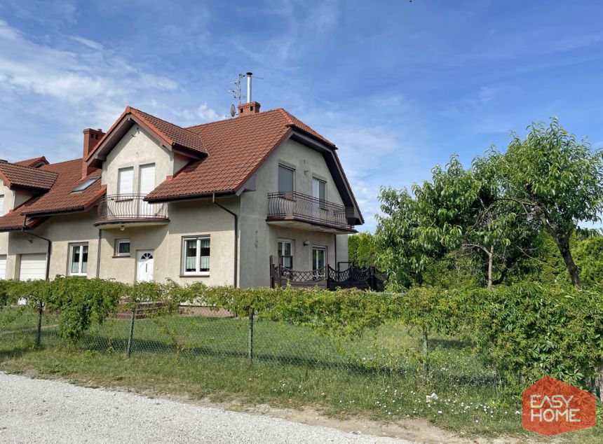 Wygodny dom z dużym ogrodem i garażem - zdjęcie 1
