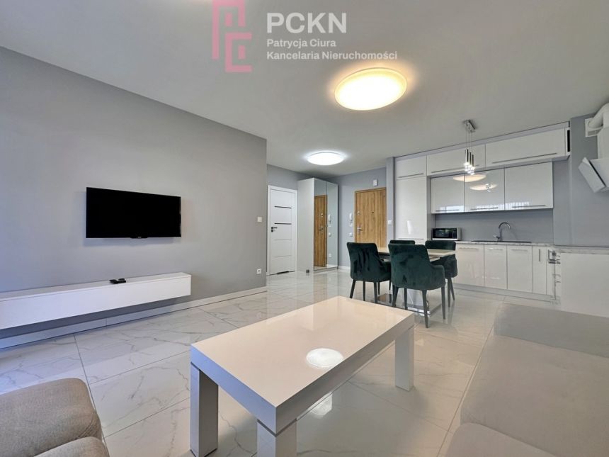Apartament z ogródkiem i mp w garażu w cenie! - zdjęcie 1