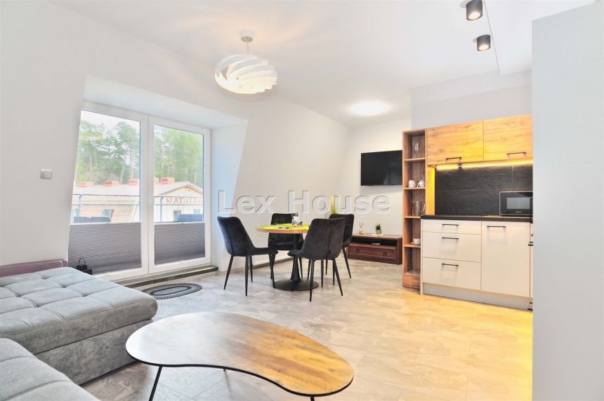 Sprzedam komfortowy apartament w Pobierowie. miniaturka 18