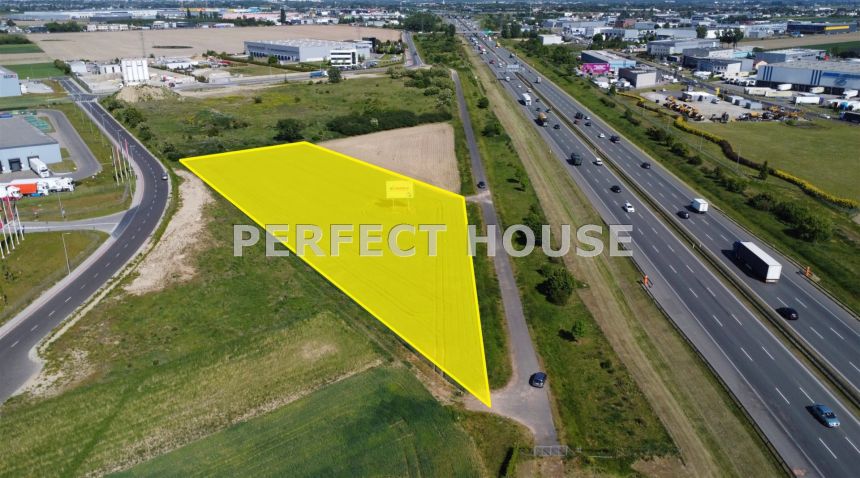 Działka przy A2 z potencjałem magazyn/produkcja - zdjęcie 1