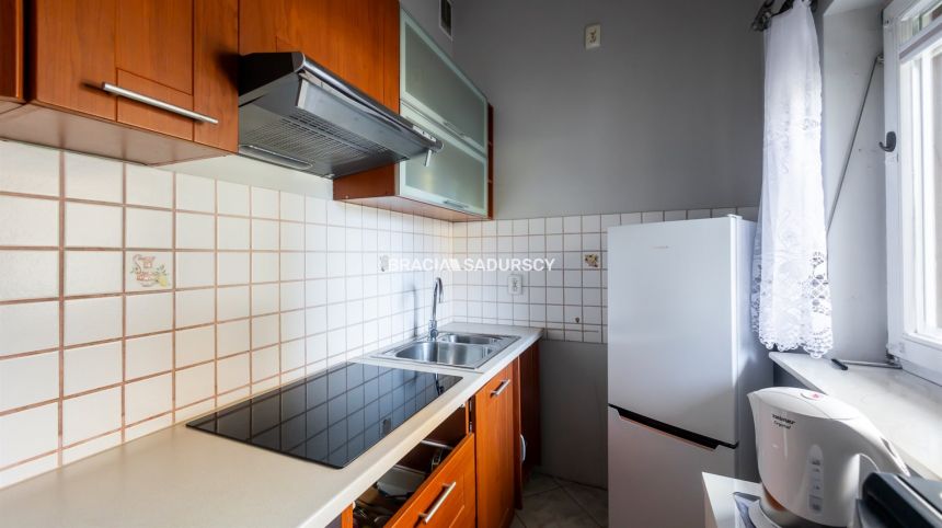 Komfortowe przestronne mieszkanie w apartamentowcu miniaturka 14