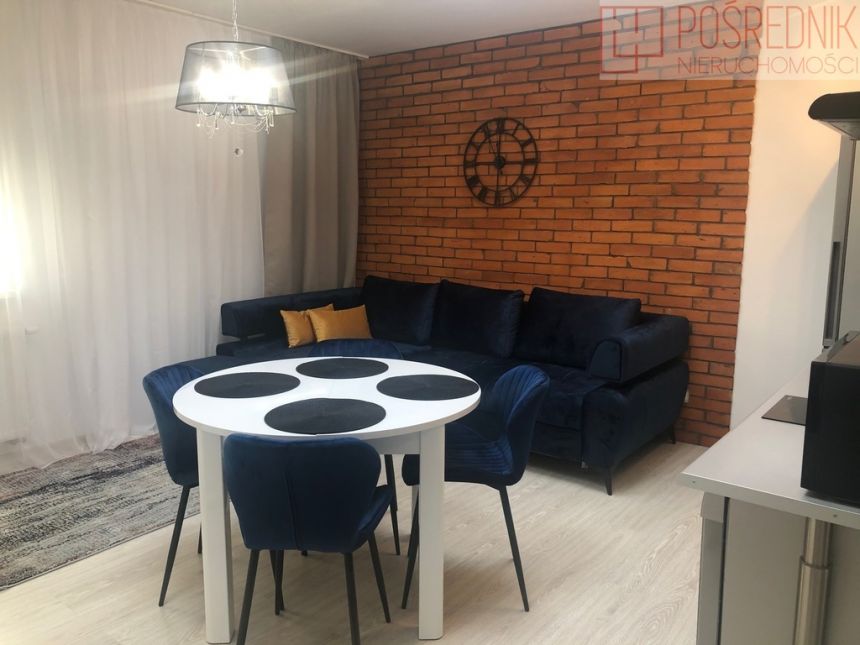 Kawalerka w Centrum z Klimatyzacją miniaturka 11
