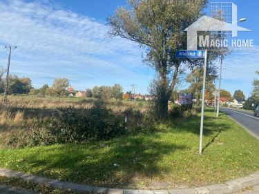 Działka inwestycyjna przy drodze głównej .