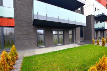Nowy apartament z tarasem iogródkiem