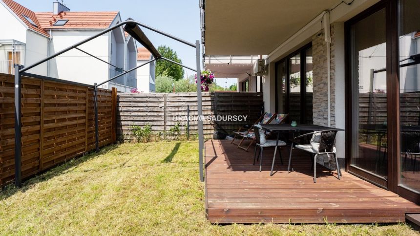 Komfortowe, zadbane 3 pokoje z tarasem i ogródkiem miniaturka 38