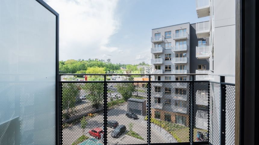 Jasna i wygodna kawalerka w apartamentowcu miniaturka 13
