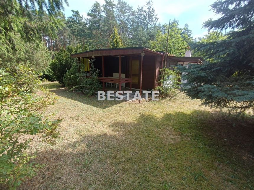 Działka ok1500 mkw z domkiem letniskowym i garażem - zdjęcie 1