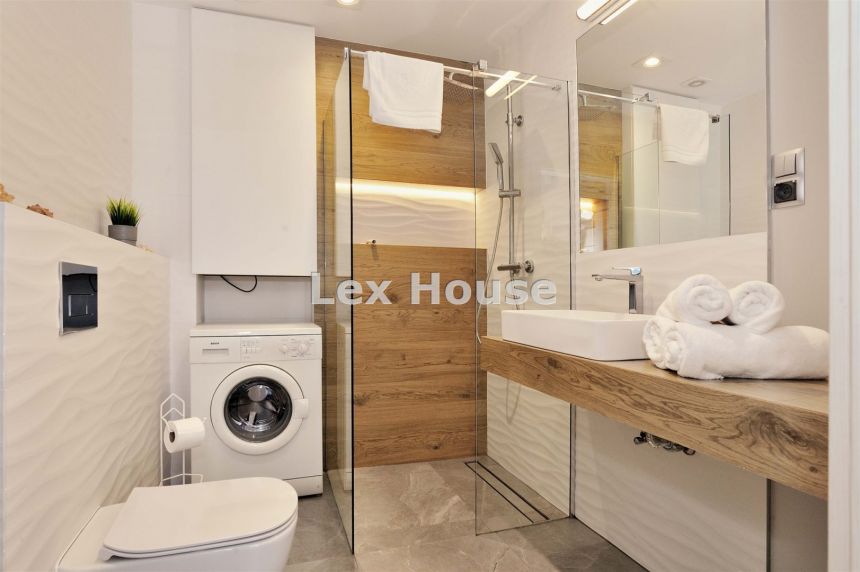 Sprzedam komfortowy apartament w Pobierowie. miniaturka 12