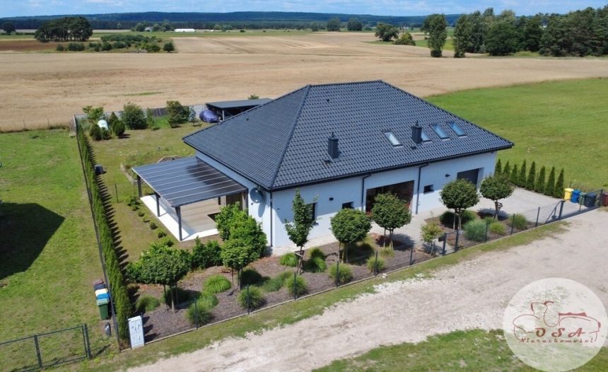Dom z 2 mieszkaniami i dużą działką blisko lasu - zdjęcie 1