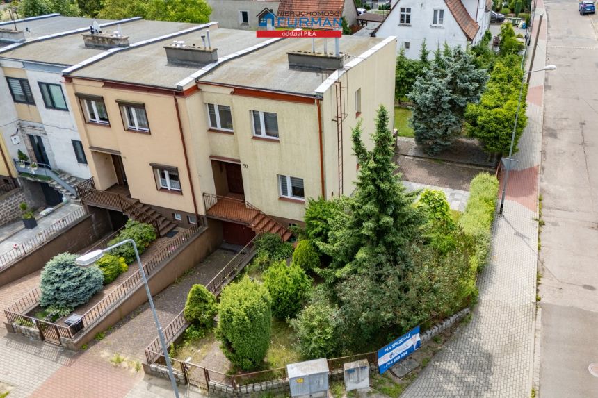 Dom w Pile na Osiedlu Górnym, skrajny szereg miniaturka 1