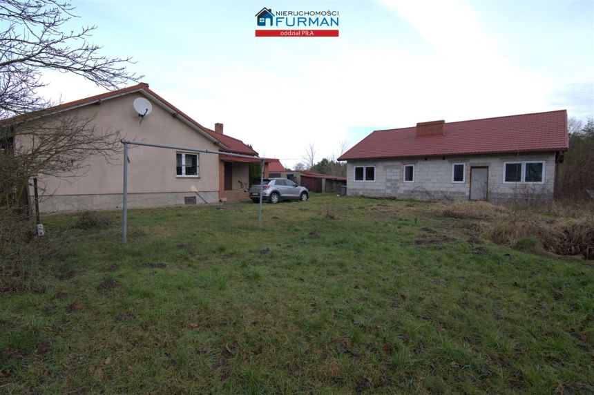 Dom + dom w stanie surowym+działka 3772 m2  Wieleń - zdjęcie 1